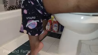 I Piss into my Toilet and Dangle my Two-Toned Feet (WMV)