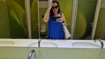 Sexy peeing in a mall bathroom 4K