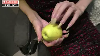 Listen to the sound of hard scratching and piercing the apple with my sharp nails
