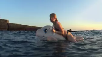 Alla rides a rare inflatable transparent whale on the waves and comes ashore and deflates the inflatable whale by opening the air valves!!!