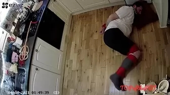 Bound and gagged man struggling in adult school uniform on kitchen floor - cam 2
