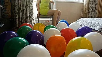 Angie sit pop all balloons on a chair 4K UHD