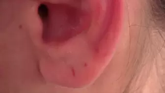 Earrings in the ears