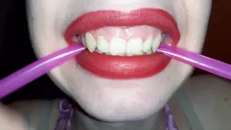 biting a pink drinking straw for 10 minutes