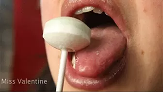 Close-up sexy and sensual lollipop licking, sucking, and biting MOV HD