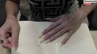 let's ruin something with nails - like pierce or scratch the paper pages and cover