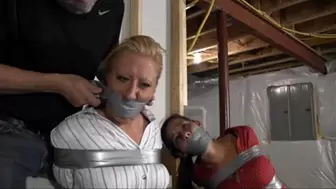 2209GRLX2-Stuff and tape a gag in her mouth so she can't warn her friend