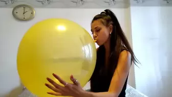 A yellow balloon will burst with a bang on Darina's plump lips