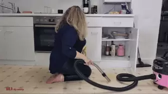 Mila - Vacuuming kitchen cabinet