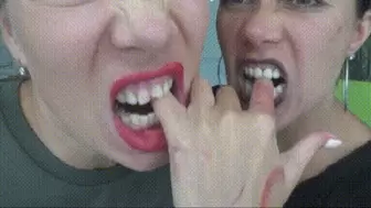 Strong vampirella teeth leave marks on their hands and fingers
