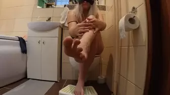 Sweaty feet on toilet and nearly showed up breast