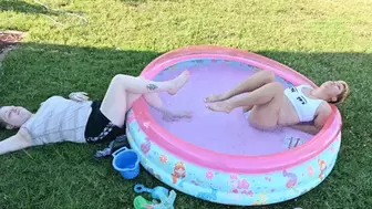 Dylan and Rhea pose in a pool (4k)