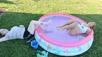 Dylan and Rhea pose in a pool (1080)