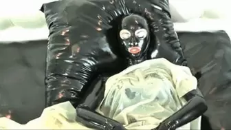 Latex doll has fun with two layers of rubber