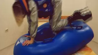 Alla wears a PVC suit and an inflatable vest and hotly fucks a big inflatable ring!!!
