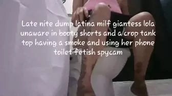 Late nite dump latina milf giantess lola unaware in booty shorts and a crop tank top having a smoke and using her phone toilet fetish spycam mkv