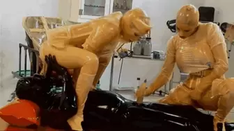 Heavy rubber threesome orgy with two latex nurses and her male patient - Part 2 of 2 - Piss on me and ride my dildo head