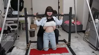 xy14 - Chinese girl bound on iron frame gets boobs toyed with