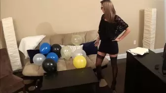 Sexy teacher sits on her balloons