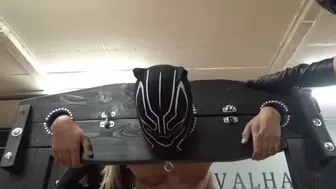 Hooded slave becomes a ball bitch
