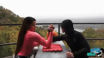 Halloween armwrestling match between 2 strong girls