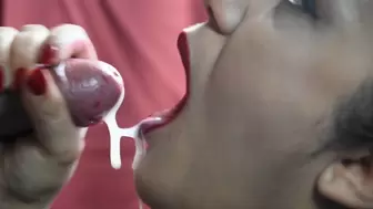 Cumshot on the tongue in close-up