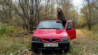 Bouncing and shaking red car Dacia