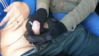 Black gloves handjob in a public bus