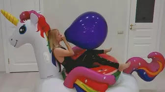 Alla blows up a purple balloon with her mouth while riding an inflatable unicorn and makes a surprise S2P!!!