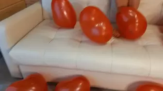 Red balloons in the form of hearts