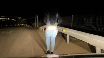 buttcrack in jeans on the road at night