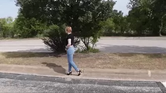 Walking Outdoors in Jeans and Black Sandals