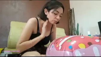 Lia spits on her inflatable