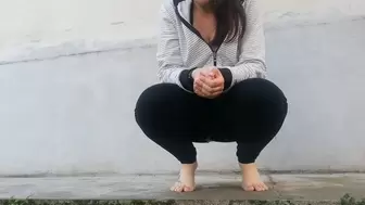 Hot yoga pants full of pee in a public garden
