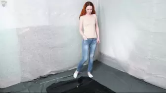 Jeans in a black vacuum bed