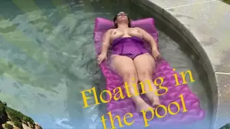 Floating in the pool