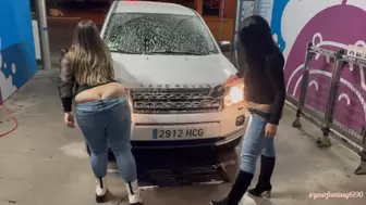 Two girls washing the car with butt cracks out