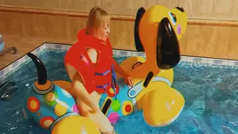 Alla naked fucks a big tight inflatable puppy in the pool and gets a hot orgasm!!!