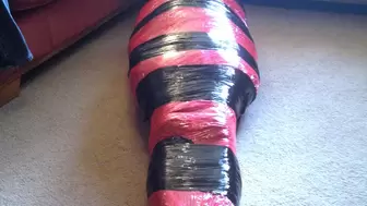 Mummification tight in pallet wrap escape challenge mummified, male bondage, BBW bondage, BBW domination, amateur,duct taped, duct tape, wrapped up man in bondage