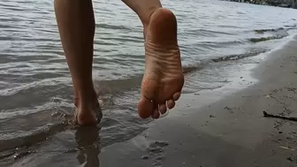 Alexa's bare feet in the sand - repost