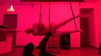 Traditional Shibari Rope Suspension scene with hot candle wax and edging
