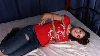 Anita: barefoot girl, dressed in red t-shirt and blue jeans, hogtied with hemp rope, rolls and wiggles on the bed (HD MOV)