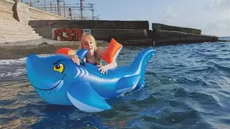 Fucking an inflatable shark on the waves of the sea near a deserted beach!!!