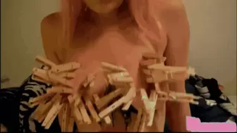 A brutal handling with titful of clothespins on young girl tits