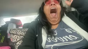 Yawning on rainy road trip