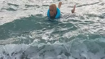 Alla swims in the sea and wears a blue inflatable vest!!!