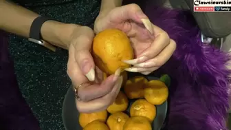Nails In Action - clawing oranges