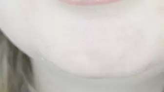 Chewing gum with pink glossy lips