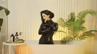 Goddess takes a bath in a latex catsuit (720p)