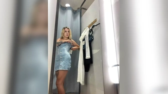 A BLONDE IN THE DRESSING ROOM FILMING HERSELF WHILE NO 1 IS WATCHING
